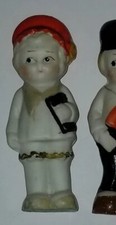 Vintage Japan bisque side glancing frozen charlotte penny school girl doll