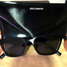 Gentle Monster Women’s Sunglasses Black Plastic Frame Gray Tinted Lenses