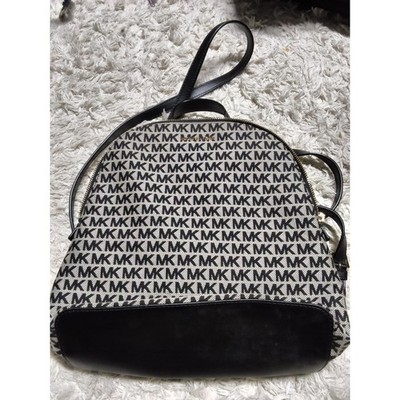 26.Michael Kors Rhea Medium Logo Backpack Black White Signature Canvas Bag