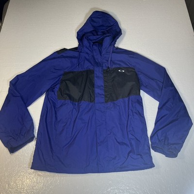 Oakley Navy blue. rain jacket. Size Medium