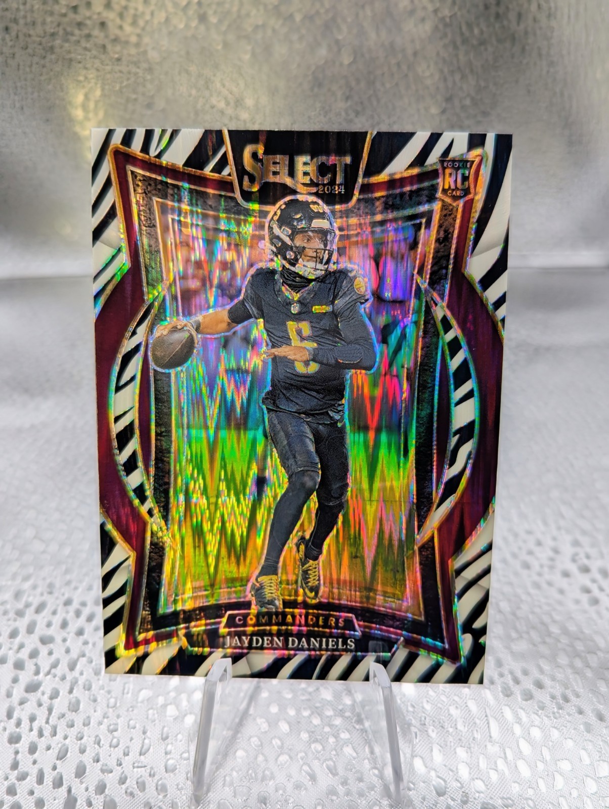 Jayden Daniels 2024 Panini Prizm Select Concourse Zebra Shock SSP RC No. 26