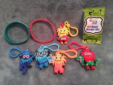 KIDS HEART CHALLENGE KEYCHAINS MYSTERY GIFT WRIST BANDS LOT OF 8