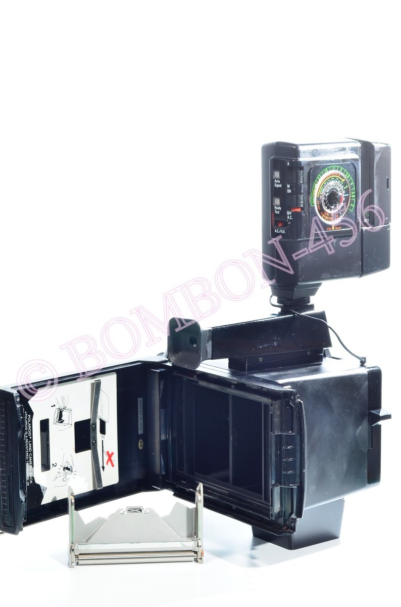 POLAROID MINIPORTRAIT CAMERA M-202. TESTED- GUARANTEED. WITH BACK