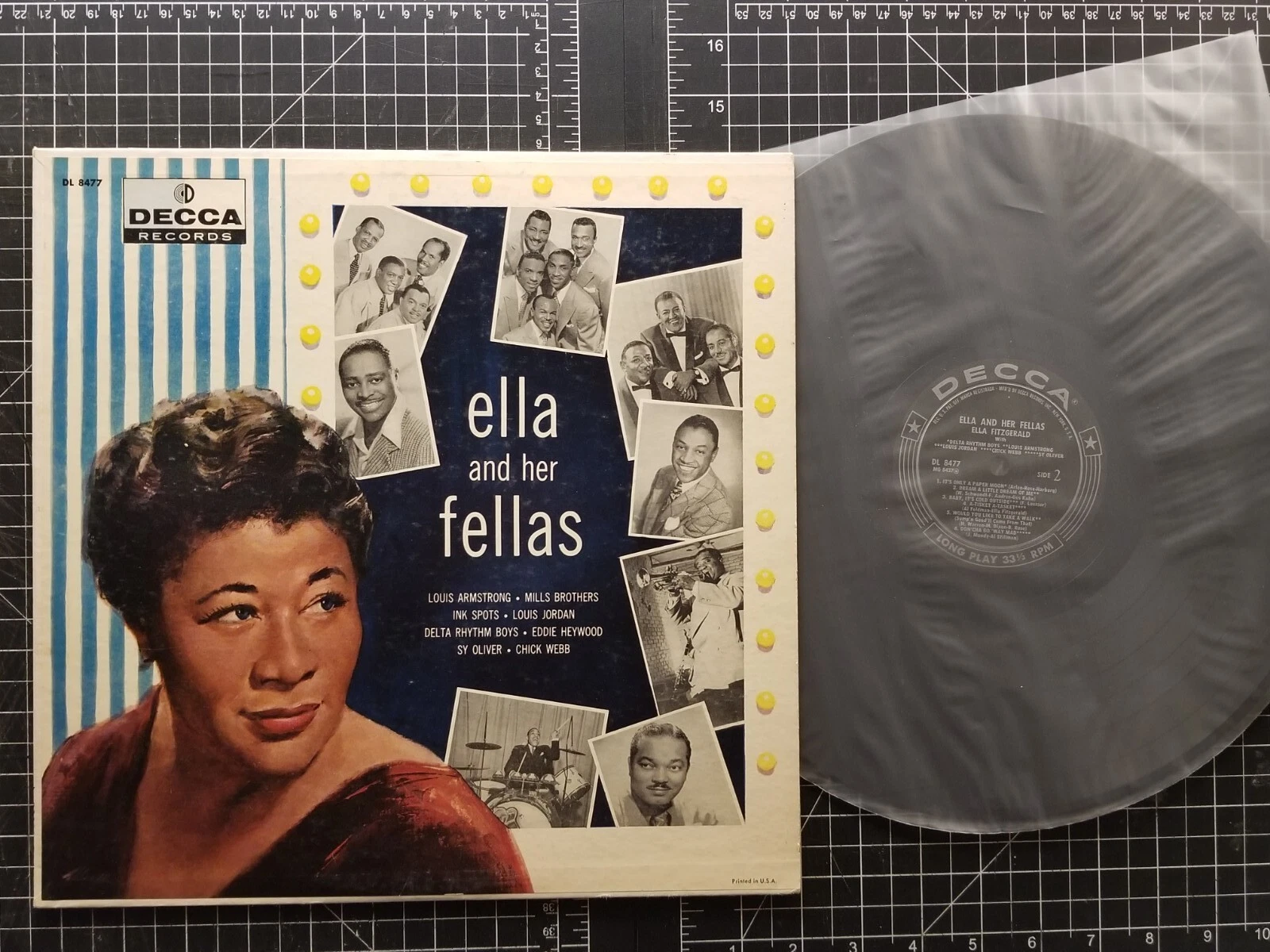 Vintage vinyl from 1957 titled Ella and her fellas showing the singer and a few of the musicians featured on her album