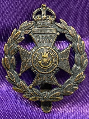 Genuine WW1 17th County of London Bn (Poplar & Stepney Rifles) GM Cap Badge