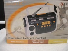 WEATHERBAND RADIO WITH FLASHLIGHT, BRAND NEW