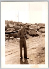 Vtg B&W Snapshot Man Holding Vintage Camera In Boatyard Harbor Boatyard June