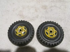 TWO WHEELS WITH METAL HUBCAPS