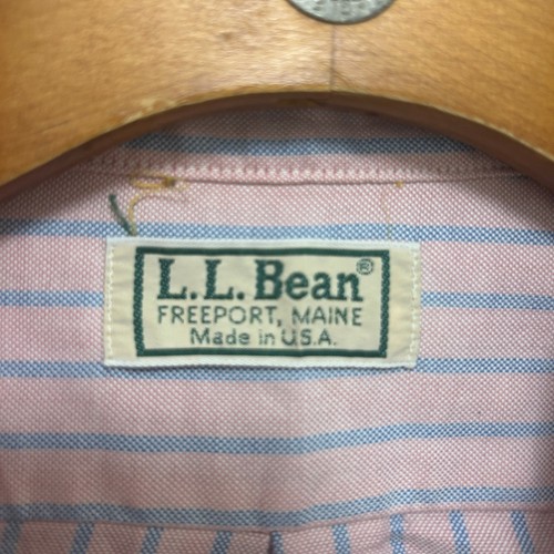 Pink, blue, and white vertical striped LL Bean short sleeve oxford shirt with green manchine and white printed label.