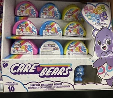 (1) Care Bears Surprise Collectible Mini Figure 2" Yellow Blue or Pink Case