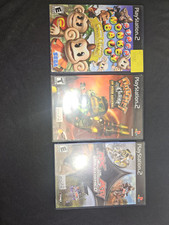 (3)PLAYSTATION 2 VIDEOGAMES SUPER MONKEY BALL DELUXE, RATCHET & CLANK, MX vs ATV