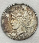 1934-D Peace Dollar $1 Denver Rainbow Toned Silver High Grade Denver Mint Coin