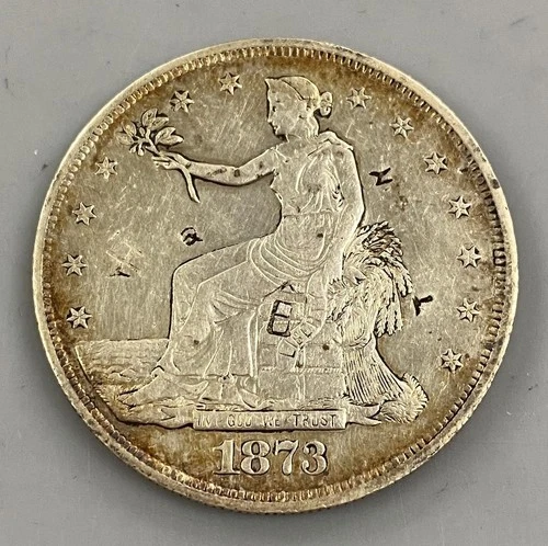1873 S US 90% Silver Trade $1 w/ chopmarks cleaned L24370