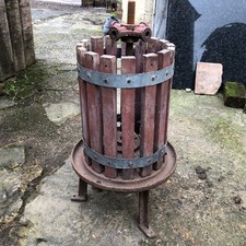 apple pulp grape fruit press steel and wood