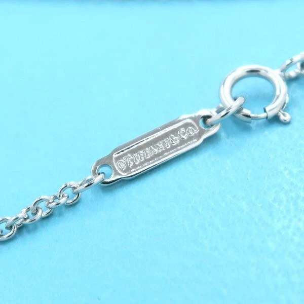 Tiffany & Co. Auténtico brazalete con etiqueta de diamantes pavé de oro blanco de 18 k Foto 3 de 4