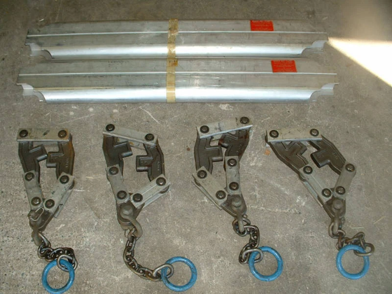 Conveyor belt puller clearance clamp