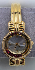 Vintage Avon AV024 Gold-Tone Bow Cuff Floating Red Crystal Watch - New Battery