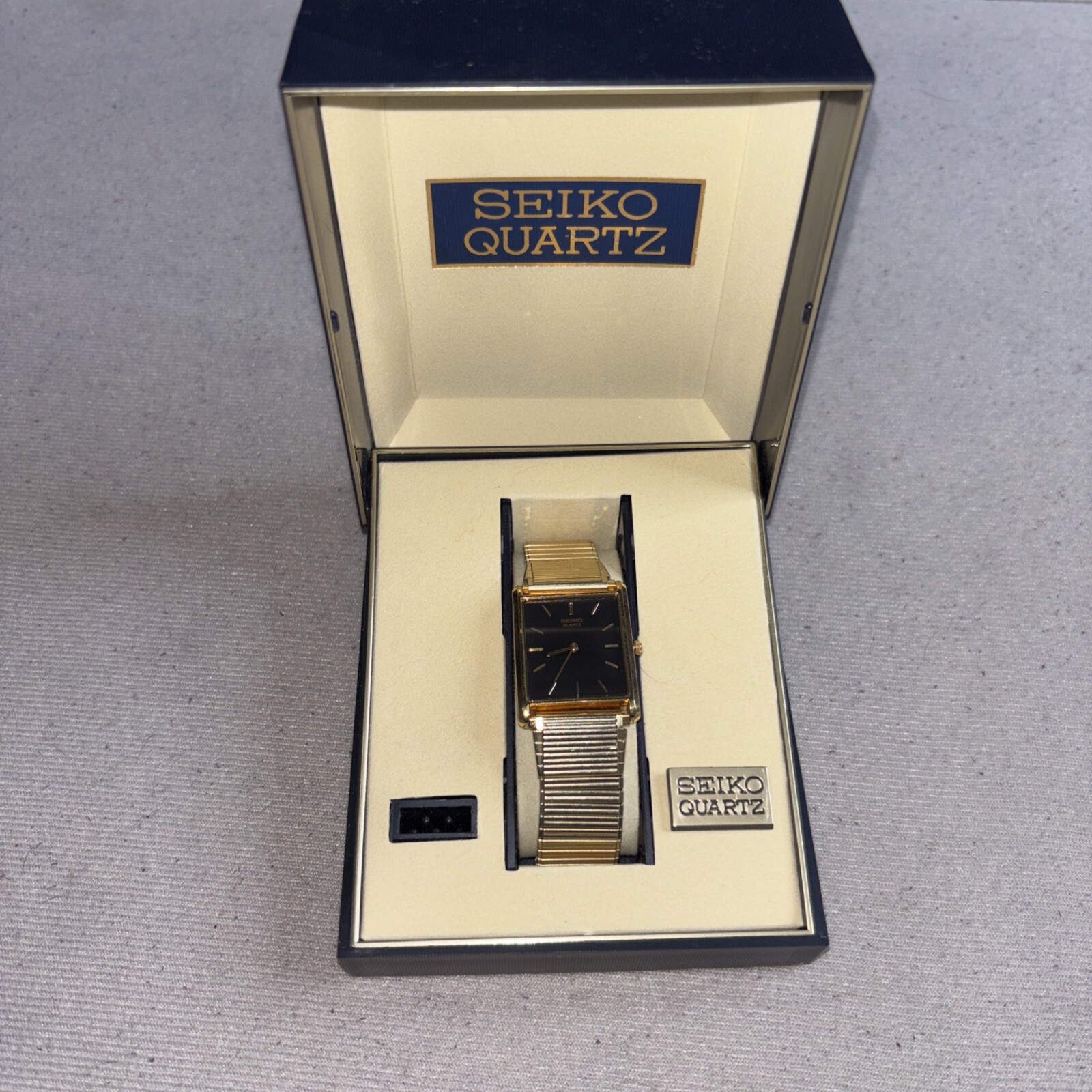 Vintage Seiko Quartz Watch Mens Gold Tone Tank Black Dial/ Japanese Movement