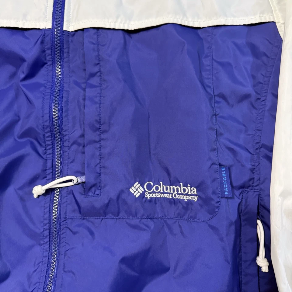 Chaqueta cortavientos Columbia para mujer L blanca púrpura con capucha y cremallera empaquetable Foto 2 de 4