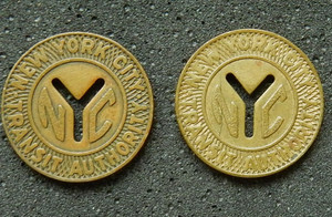 New York City NYC subway tokens x2, small Y cutout. Vintage tokens.