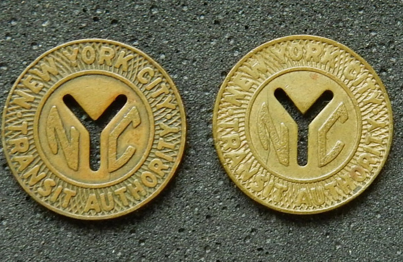 New York City NYC subway tokens x2, small Y cutout. Vintage tokens.
