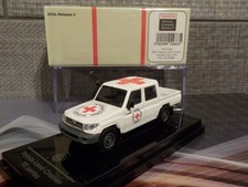 Paragon 1/64 Toyota Land Cruiser Double Cab Pickup LC79 Red Cross 2014  (High Qu