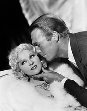 Randolph Scott caresses Mae West's chin in this publicity still fr- Old Photo