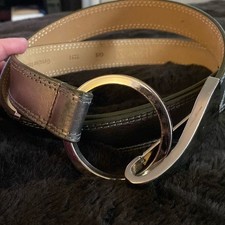 Metallic gray belt. Adjustable up to 40  