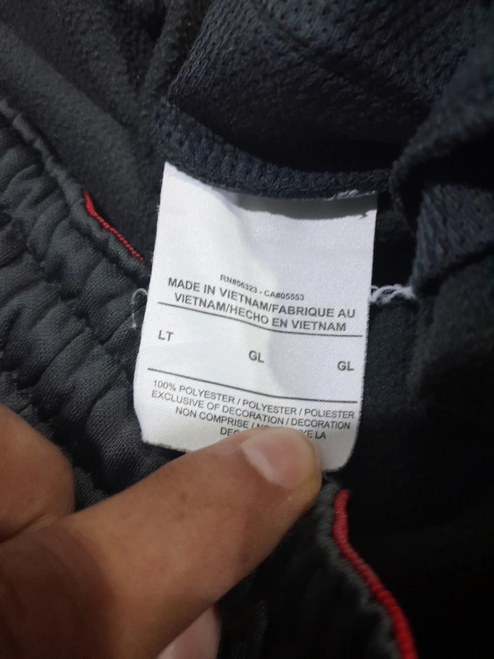 Pantalones deportivos Nike para hombre LT cónicos grises rojos Swoosh cintura elástica puños deportivos Foto 4 de 4