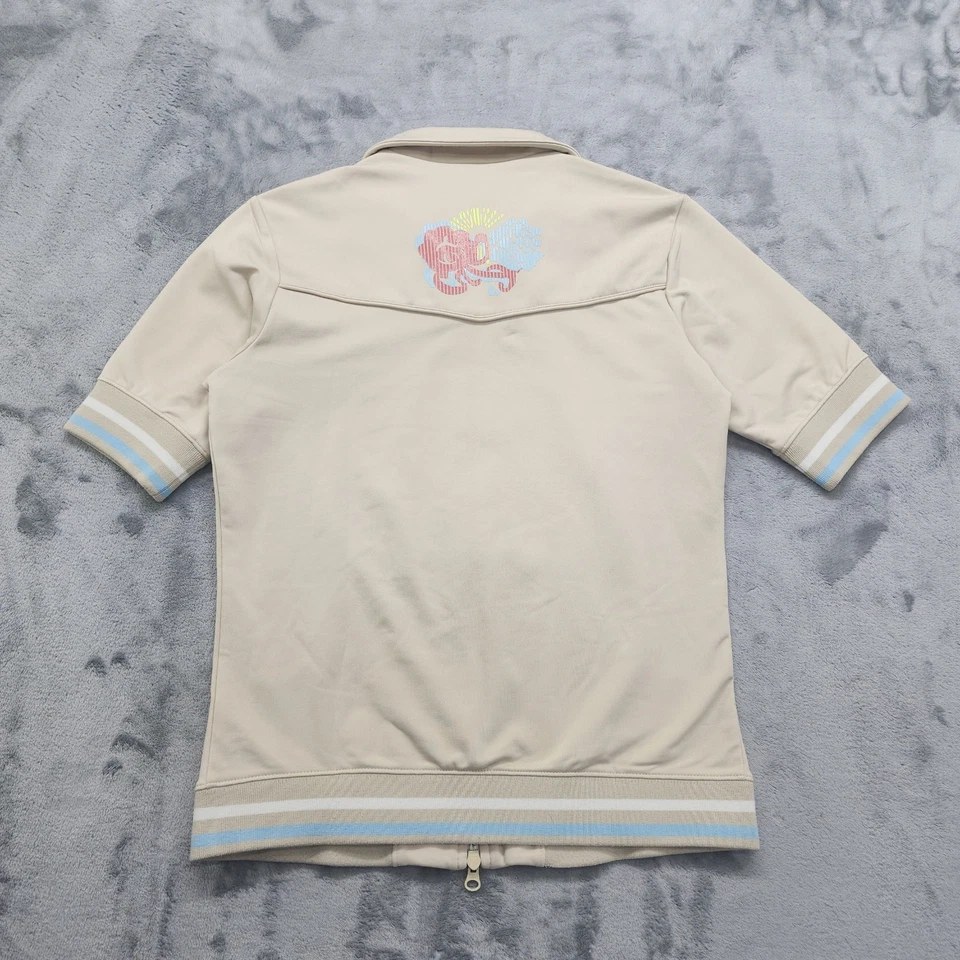 Chaqueta Athleta Mujer S Beige Azul Espalda Flor Gráfico Cremallera Completa Manga Corta Foto 2 de 4