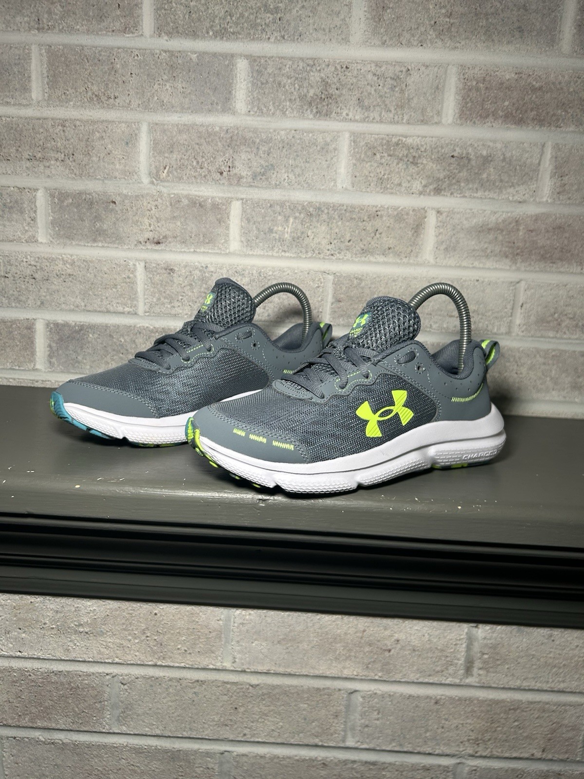 SAOLA Scarpe da ginnastica Under Armour Assert grigie 3026182 102 giovani taglia 5 5