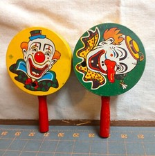 2 Vintage Tin Noisemaker Rattles with Clowns US Metal Toy Mfg Co