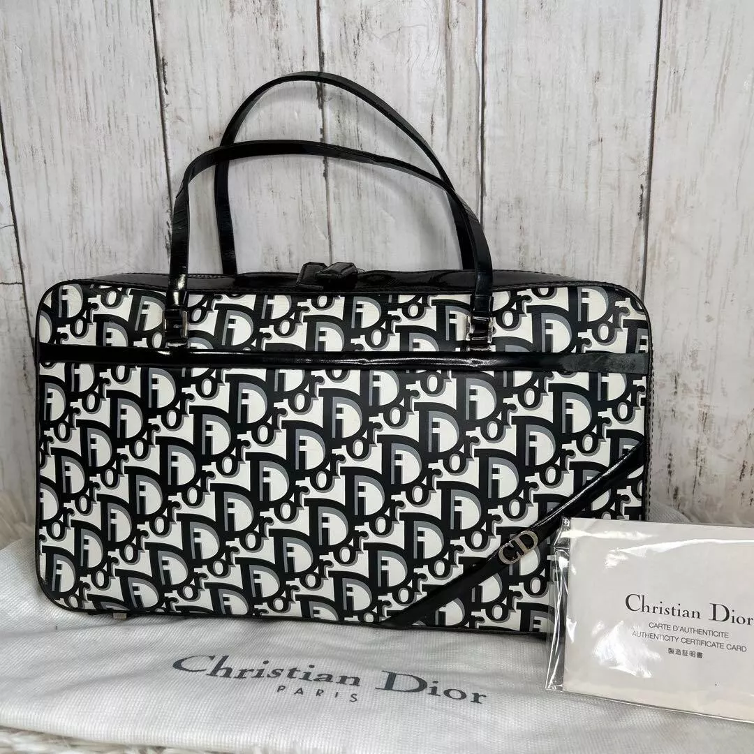 Sac à main Christian Dior Trotter émail CD logo noir blanc cuir Occasion 202503M