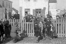 WW II German Photo **  Soldier Taking Picture Of Children In Jewish Ghetto  **