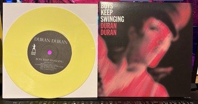 DURAN DURAN Boys Keep Swinging 7'' Yellow Vinyl B/ CARLA BRUNI Absolute Beginners