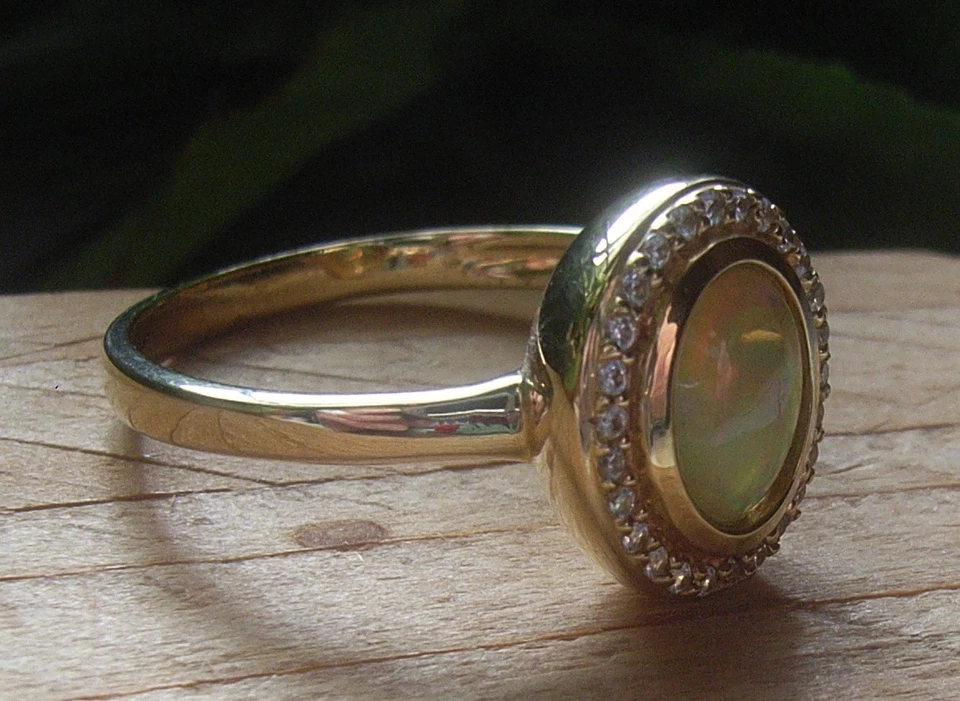 ®Terra Opalis 585/- (14K) GG Ring mit 1,0 ct. Kristallopal und Zirkonen,RW 19 mm - Bild 2 von 4