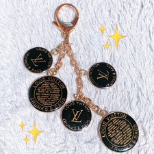 Louis Vuitton Bag Charm Keychain Medal Black Gold color for women