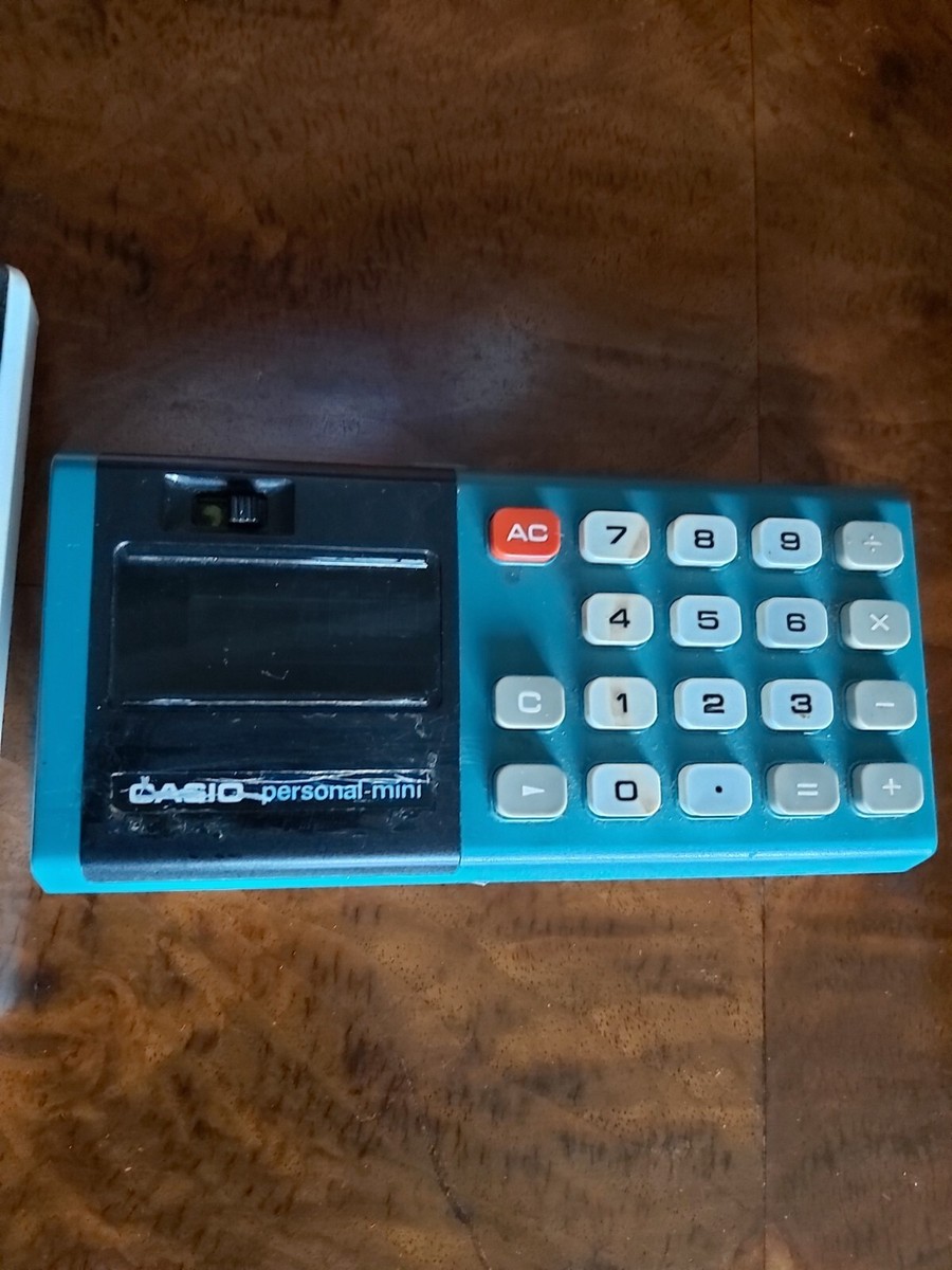 Vintage Casio Personal Mini Calculator green Vacuum Display 1974 CM-607