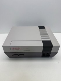 Nintendo NES Action Set Console Tested Working 2 controllers 1 gun