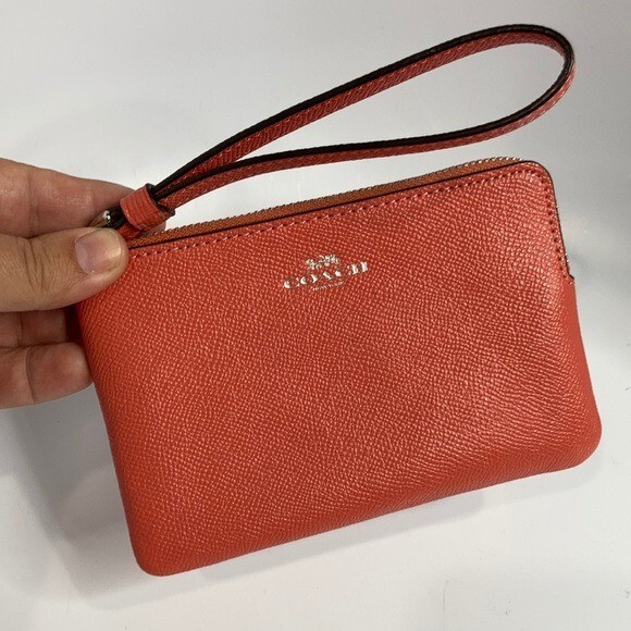 Coach small wristlet clutch coral