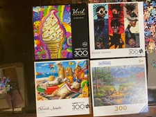 Large Piece Puzzles Lot of 4 Jigsaw Puzzles - 300 Pieces Each, EZ Grip. Complete