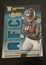 2013 Panini Absolute Premiere Materials AFC/NFC /99 Denard Robinson Rookie RC