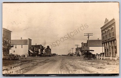 K42/ Hitchcock South Dakota Postcard RPPC c1910 Main Street Stores 500