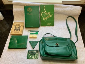 1950s-Girl-Scout-pocketbook-filled-with-Books-Toothbrush-File-Change-Purse-etc