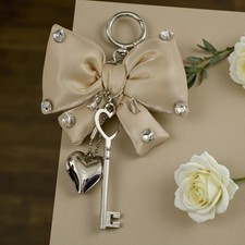 CIONDOLO FORMA FIOCCO COMPLEANNO GENERICO SEGNAPOSTO 18 ANNI 30