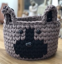 Adorable Crocheted Black And Brown Dog Basket Perfect For a Baby Nursery 