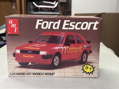 UNBUILT 1:25 AMT ERTL plastic model car kit FORD ESCORT 3 in 1 #6528 | eBay