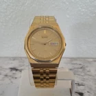 Seiko SQ Quartz 8C23-6059 Octagonal Day Date Gold Tone Textured Dial VTG
