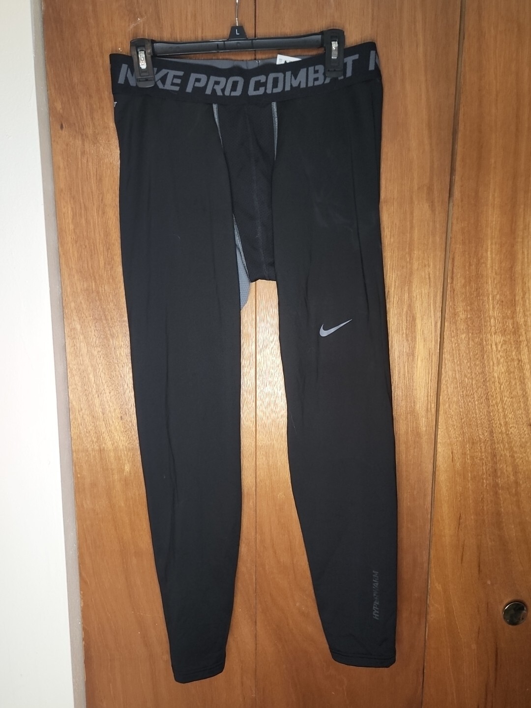 Leggings para mujer Nike Pro Combat negros talla grande con logotipo de entrenamiento deportivo-image