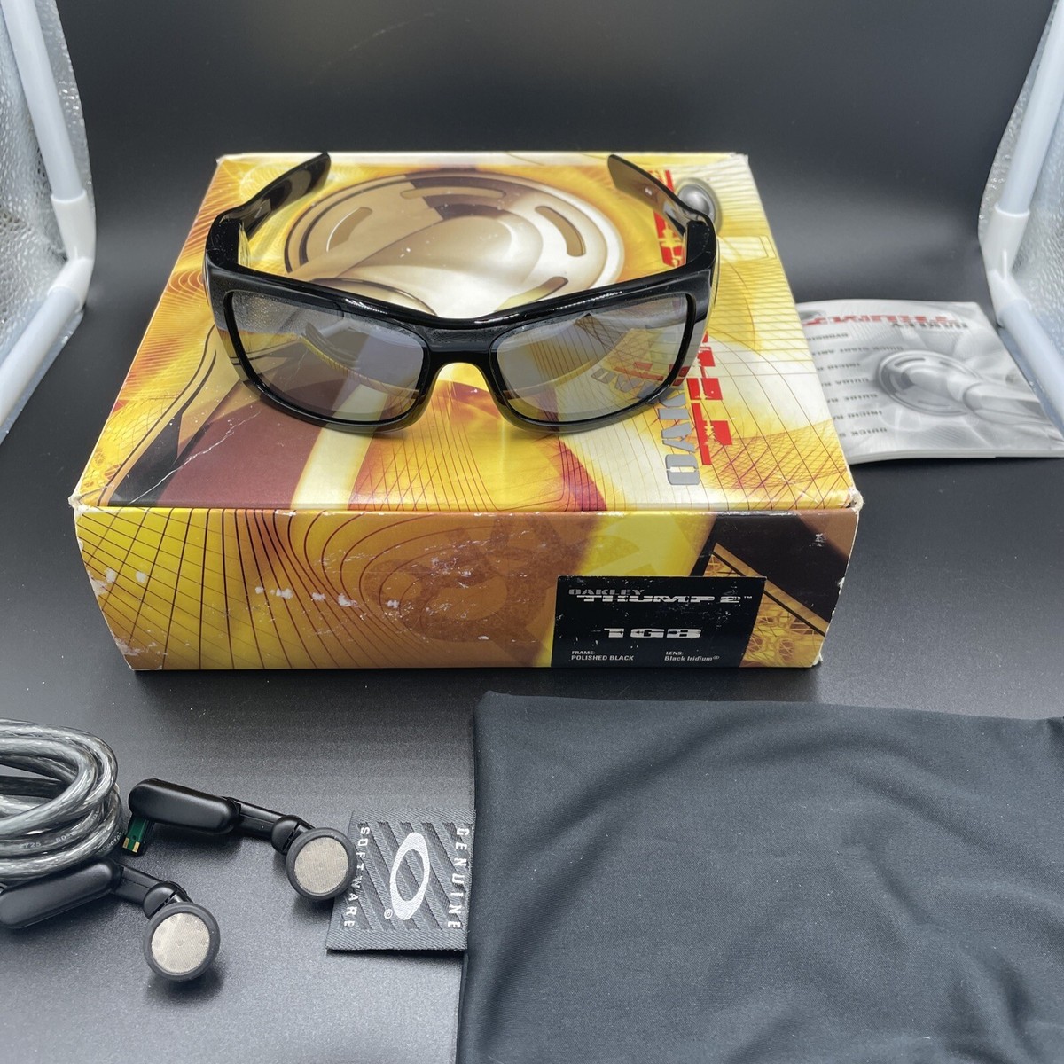 oakley thump 2 1gb T pain polished blk w Blk iridium lenses oakley thump 2 1gb T pain polished blk w Blk iridium lenses
